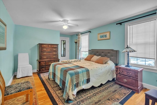 33 Dean St, Norton, MA 02766 - bedroom featuring light wood-style floors, multiple windows, and a ceiling fan