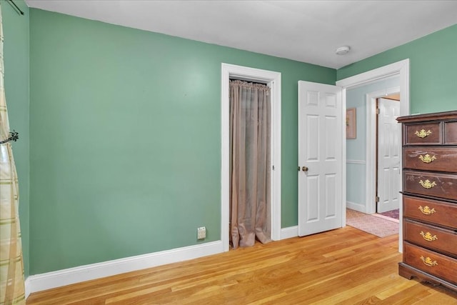33 Dean St, Norton, MA 02766 - unfurnished bedroom with light wood-type flooring and a closet
