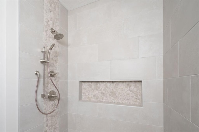 details with a tile shower