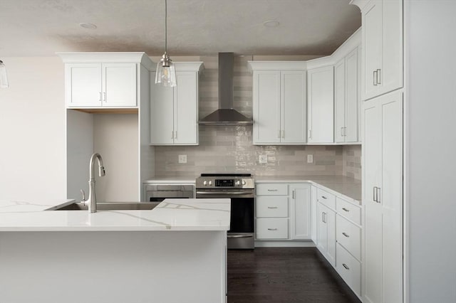 kitchen with white cabinetry, stainless steel range with electric cooktop, and wall chimney range hood