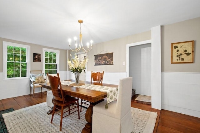 38 S St, Grafton, MA 01519 - dining space featuring a chandelier, wood finished floors, and wainscoting