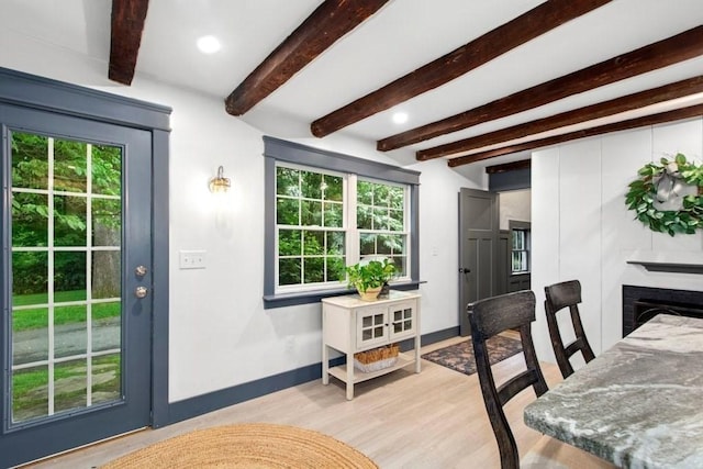 38 S St, Grafton, MA 01519 - dining area featuring light wood finished floors, beam ceiling, a fireplace, and recessed lighting