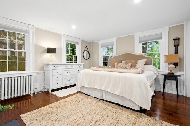 38 S St, Grafton, MA 01519 - bedroom featuring radiator heating unit, dark wood-style flooring, multiple windows, and recessed lighting