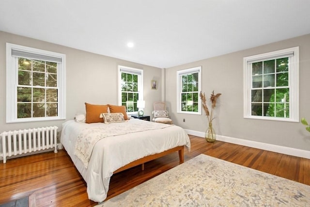 38 S St, Grafton, MA 01519 - bedroom featuring radiator heating unit, wood finished floors, and recessed lighting