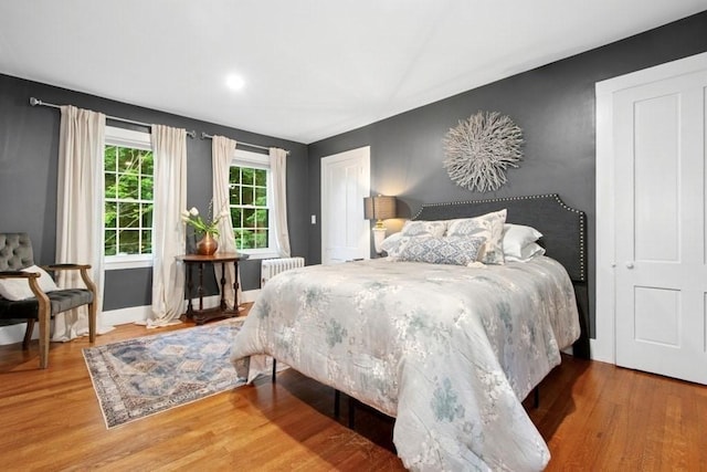 38 S St, Grafton, MA 01519 - bedroom featuring radiator and wood finished floors