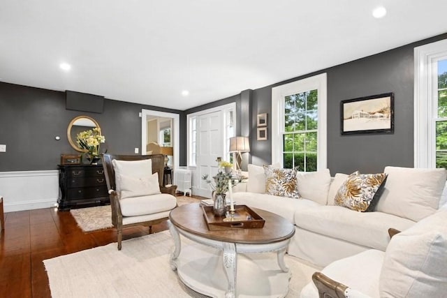 38 S St, Grafton, MA 01519 - living room with radiator, wood finished floors, and recessed lighting