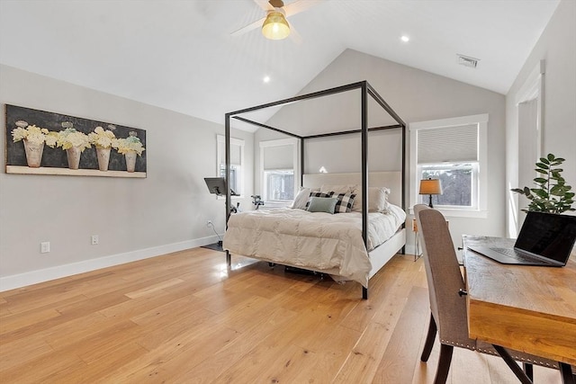 bedroom with high vaulted ceiling, light hardwood / wood-style floors, and ceiling fan