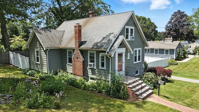 182 Winn St, Woburn, MA 01801 - view of front of house with a chimney