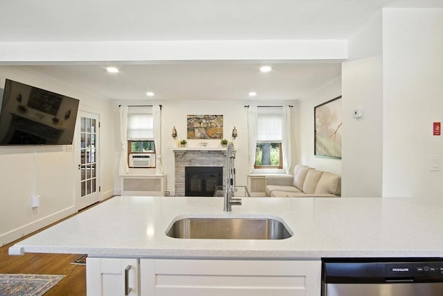 182 Winn St, Woburn, MA 01801 - kitchen featuring dishwasher, open floor plan, white cabinetry, and recessed lighting