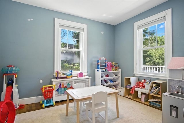 182 Winn St, Woburn, MA 01801 - recreation room featuring plenty of natural light and wood finished floors