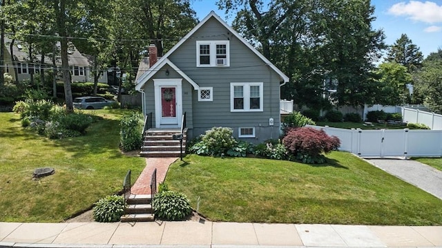 182 Winn St, Woburn, MA 01801 - bungalow featuring a chimney and a gate