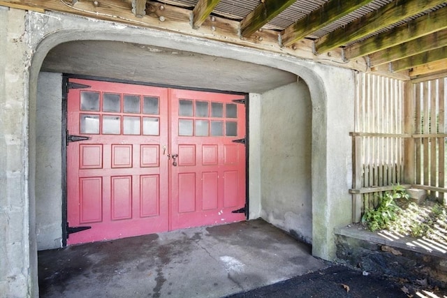 182 Winn St, Woburn, MA 01801 - doorway to property featuring stucco siding and a garage