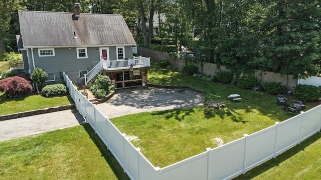 182 Winn St, Woburn, MA 01801 - back of house with a wooden deck, a fenced backyard, stairs, a chimney, and a shingled roof
