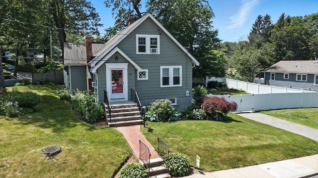 182 Winn St, Woburn, MA 01801 - bungalow-style home with a chimney