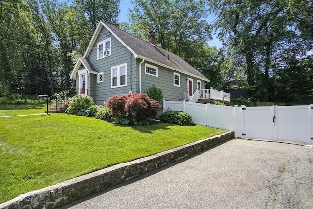 182 Winn St, Woburn, MA 01801 - view of property exterior featuring a gate, a chimney, driveway, and roof with shingles