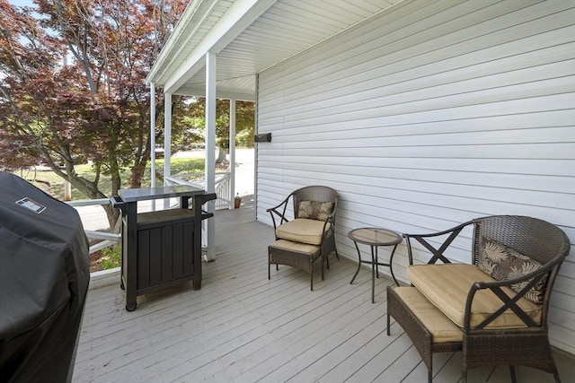wooden terrace with grilling area