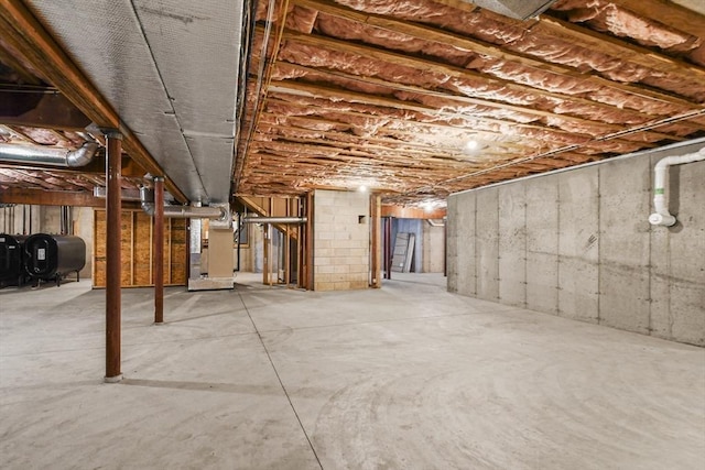 42 High St, Freetown, MA 02702 - unfinished basement with oil tank and heating unit