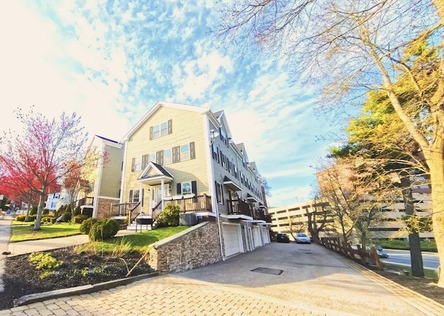 view of front of house featuring driveway and a garage