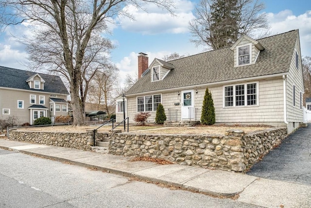 view of new england style home