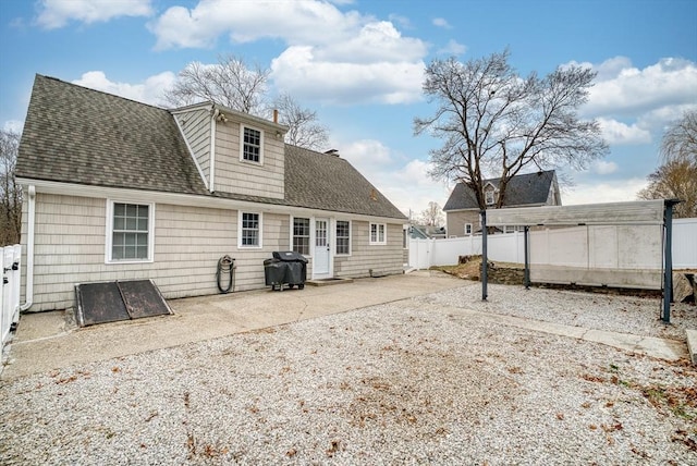 back of property featuring a patio