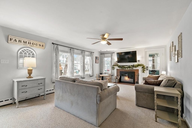 carpeted living room with ceiling fan