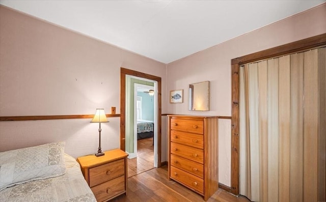 bedroom featuring wood finished floors