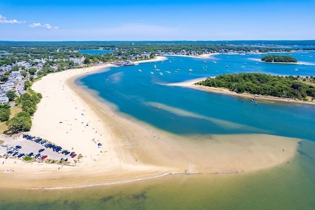 aerial view with a water view and a view of the beach