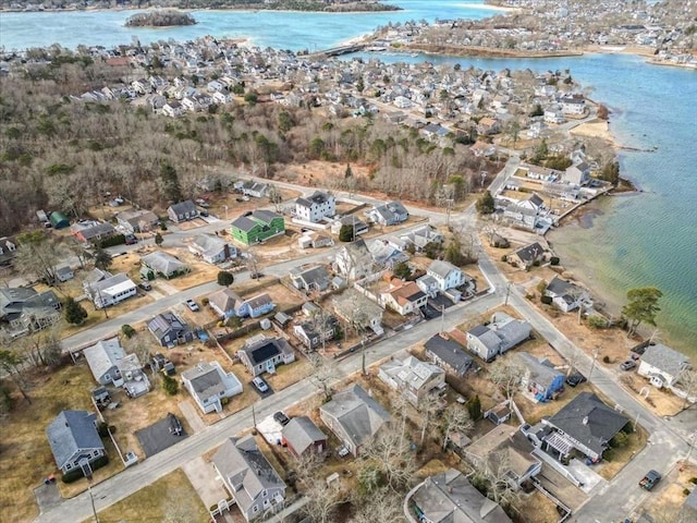 birds eye view of property with a residential view and a water view