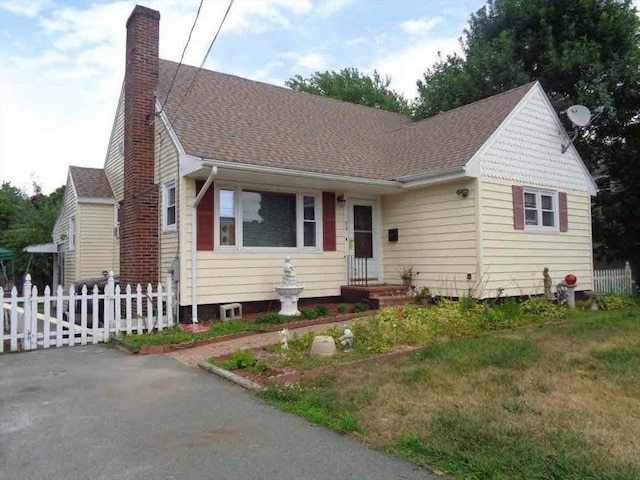 view of front of home with a front yard