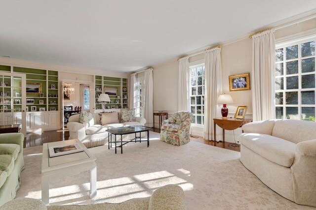 living room featuring a notable chandelier