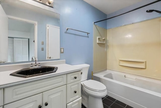 full bathroom with tile patterned flooring, vanity, toilet, and shower / washtub combination