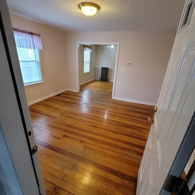 empty room with light wood-type flooring