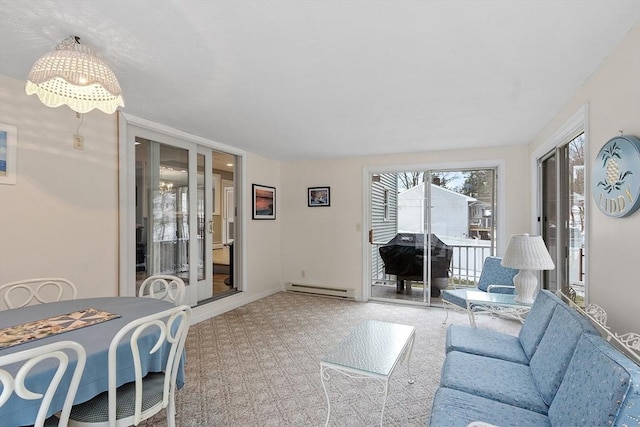 carpeted living room featuring a baseboard radiator