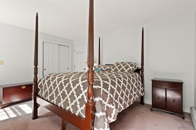 112 Stoddard Dr, North Attleboro, MA 02760 - carpeted bedroom with a baseboard radiator, a closet, and baseboards