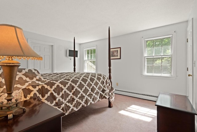 112 Stoddard Dr, North Attleboro, MA 02760 - carpeted bedroom with a baseboard heating unit