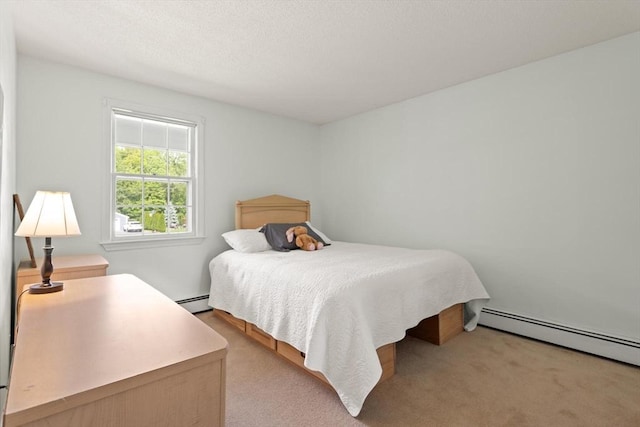 112 Stoddard Dr, North Attleboro, MA 02760 - carpeted bedroom with a baseboard radiator