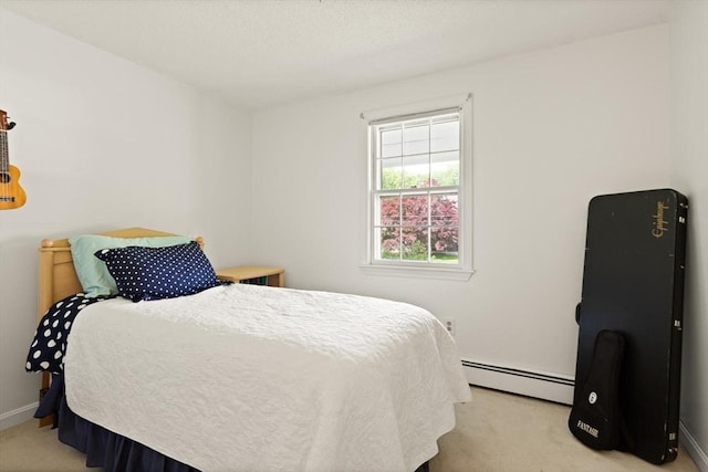 112 Stoddard Dr, North Attleboro, MA 02760 - bedroom with a baseboard radiator, light carpet, and baseboards