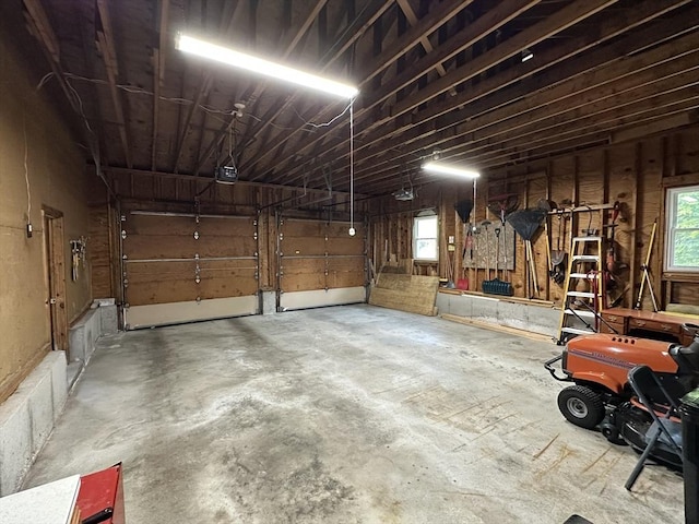 112 Stoddard Dr, North Attleboro, MA 02760 - garage featuring a garage door opener