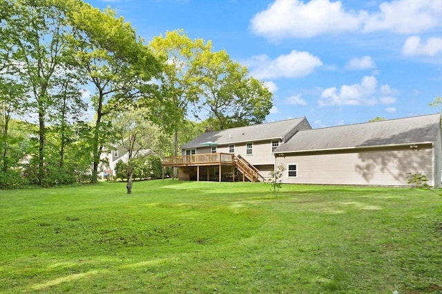 112 Stoddard Dr, North Attleboro, MA 02760 - view of green lawn featuring stairs and a deck