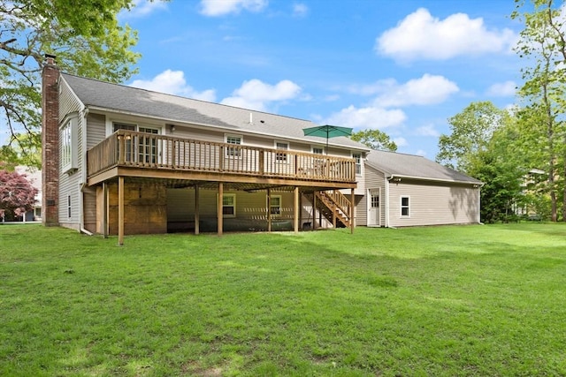 112 Stoddard Dr, North Attleboro, MA 02760 - back of property with a deck, a chimney, stairway, and a yard