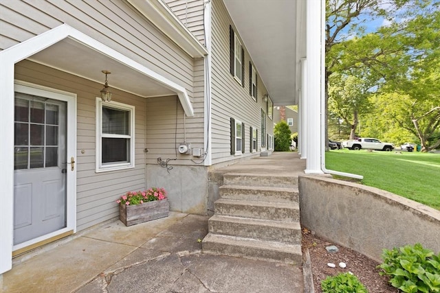 112 Stoddard Dr, North Attleboro, MA 02760 - view of exterior entry featuring a yard and a porch