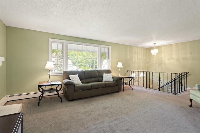 112 Stoddard Dr, North Attleboro, MA 02760 - carpeted living area with a chandelier and a textured ceiling