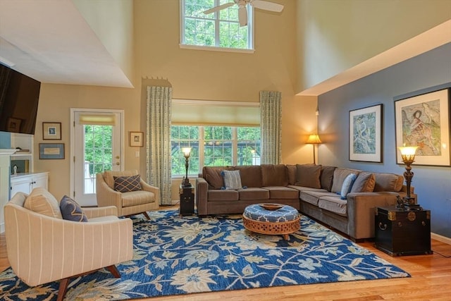 44 Stevens Rd Unit 44, Hudson, MA 01749 - living area featuring a high ceiling, a ceiling fan, and wood finished floors