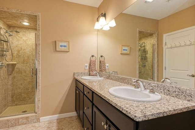 44 Stevens Rd Unit 44, Hudson, MA 01749 - bathroom with double vanity, a stall shower, and tile patterned floors
