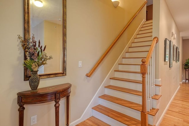 44 Stevens Rd Unit 44, Hudson, MA 01749 - stairs featuring wood finished floors and baseboards