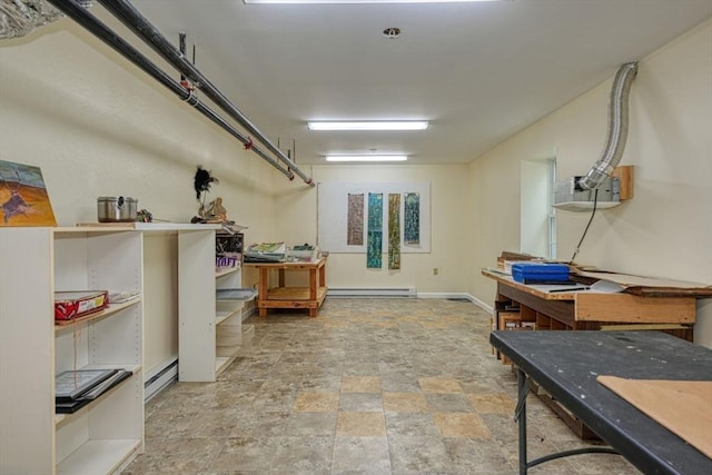 44 Stevens Rd Unit 44, Hudson, MA 01749 - basement with stone finish flooring and baseboard heating