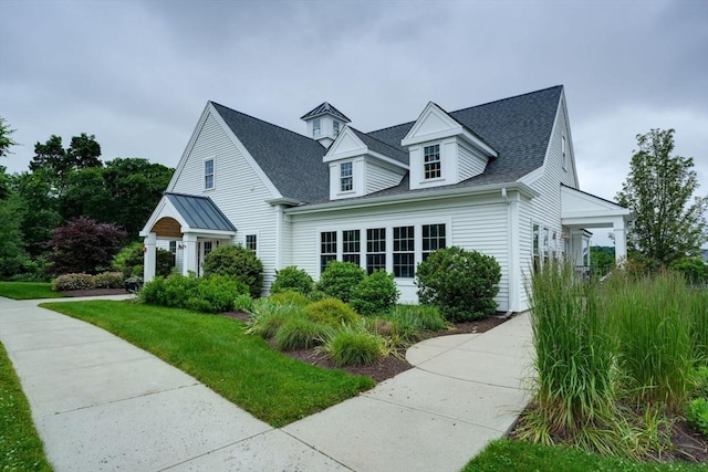 44 Stevens Rd Unit 44, Hudson, MA 01749 - view of front facade featuring roof with shingles and a front yard