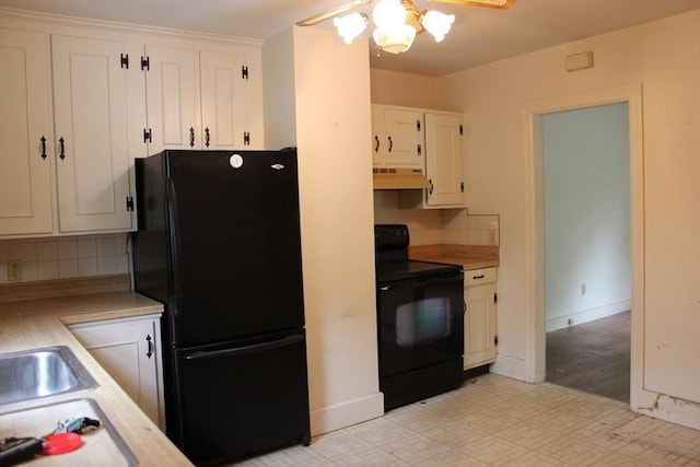 kitchen with black appliances, under cabinet range hood, light countertops, ceiling fan, and tasteful backsplash