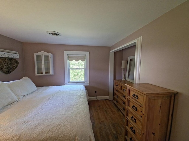 48 Sofia Rd, Stoughton, MA 02072 - bedroom with dark wood-style floors and baseboards
