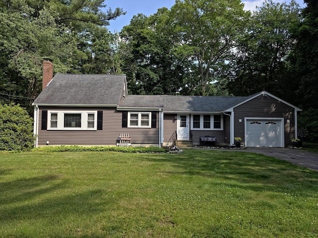 48 Sofia Rd, Stoughton, MA 02072 - view of front of home with a chimney, entry steps, an attached garage, asphalt driveway, and a front yard